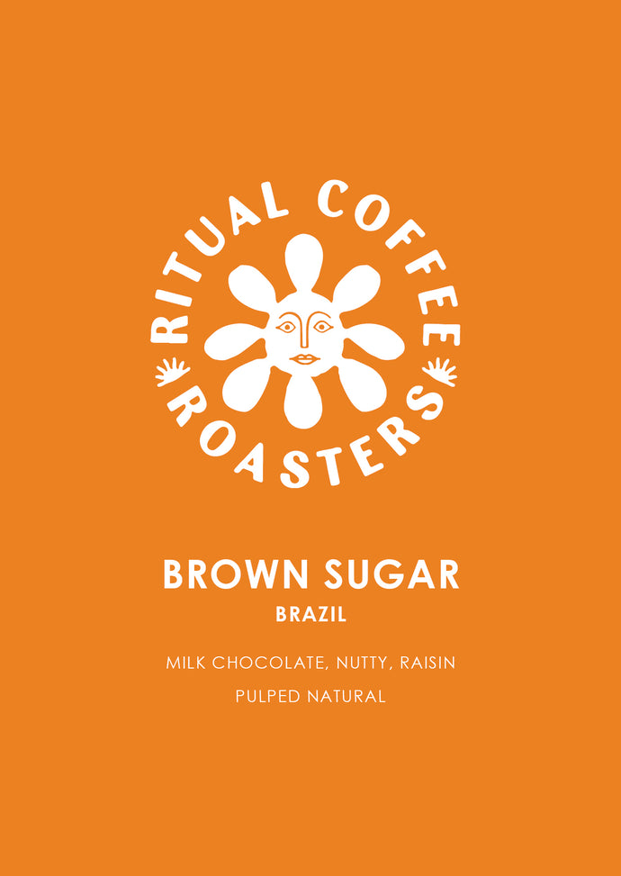 Brown Sugar Blend by Ritual Coffee Roasters – Brazil. Coffee label on orange background with tasting notes: milk chocolate, nutty and raisin.